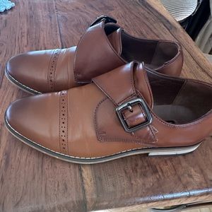 Brown dress boys shoes .